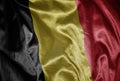 colorful shining big national flag of belgium on a silky texture Royalty Free Stock Photo