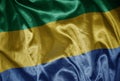 colorful shining big national flag of gabon on a silky texture