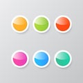 Colorful shiny buttons on a gray background . Royalty Free Stock Photo