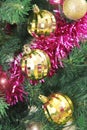 Colorful shiny Christmas toys balls on the tree for the new year holiday Royalty Free Stock Photo