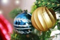 Colorful shiny Christmas toys balls on the tree for the new year holiday Royalty Free Stock Photo