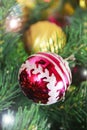 Colorful shiny Christmas toys balls on the tree for the new year holiday Royalty Free Stock Photo