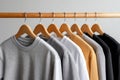 Colorful shirts hanging on hangers. Generative AI. Royalty Free Stock Photo