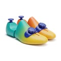 Colorful shoe trees for shoe care and maintenance on white background Royalty Free Stock Photo