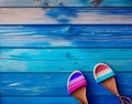 Colorful shoes on a blue wooden background. Copy space Royalty Free Stock Photo