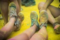 The colorful shoes and legs of teenagers at color run event Royalty Free Stock Photo