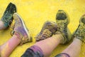 The colorful shoes and legs of teenagers at color run event Royalty Free Stock Photo