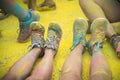 The colorful shoes and legs of teenagers at color run event Royalty Free Stock Photo