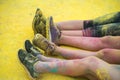 The colorful shoes and legs of teenagers at color run event Royalty Free Stock Photo