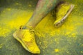 The colorful shoes and legs of teenagers at color run event Royalty Free Stock Photo