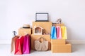 Colorful shopping bag with stack of cardboard boxes and fashion items at home, Website online shopping concept