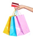 Colorful Shopping Bags and Credit Card in Female Hand isolated Royalty Free Stock Photo