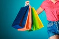 Colorful shopping bags in female hand. Sale retail Royalty Free Stock Photo