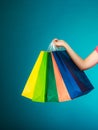 Colorful shopping bags in female hand. Sale retail Royalty Free Stock Photo