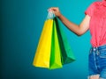 Colorful shopping bags in female hand. Sale retail Royalty Free Stock Photo