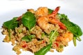 Colorful shrimp spinach quinoa salad on a white plate Royalty Free Stock Photo