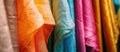 Colorful silk fabrics hanging on a stand Royalty Free Stock Photo