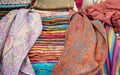 Silk pashmina scarves or shawls for sale at farmers market Royalty Free Stock Photo