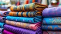 Colorful silk rolls neatly arranged in a bustling market stall, tempting passersby with their vibr