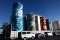 Popular tourist sightseeing attraction of colorful painted silos in sunny blue sky in Wynyard Quarters, Auckland, New Zealand