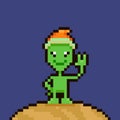 Simple flat pixel art illustration of cartoon friendly smiling green alien in red santa hat standing on the planet Royalty Free Stock Photo