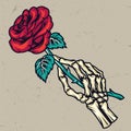 Colorful skeleton hand holding beautiful rose Royalty Free Stock Photo