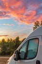 Colorful sky with camper