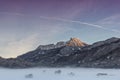 Colorful sky at sunrise with huge mountain