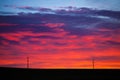 Colorful sky at sunrise with telephone pole and line Royalty Free Stock Photo