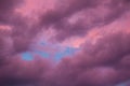 Colorful skyscape with purple clouds at sunset twilight