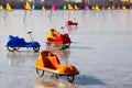 Colorful sleighs in car design on ice sheet Royalty Free Stock Photo