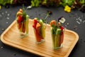 Colorful slices of raw vegetables in glasses carrots, cucumber, sweet pepper. The concept of diet, healthy and vegetarian food