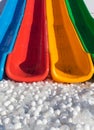 Colorful slides and a bed of cushioning balls Royalty Free Stock Photo