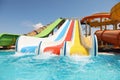 Colorful slides in water park. Summer