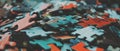 Colorful sliding puzzle pieces arranged in diverse patterns with smooth textures