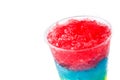 Colorful slushie of differents flavors with straw in plastic cup Royalty Free Stock Photo