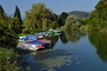 Colorful small boats moored at the bank of the river Royalty Free Stock Photo