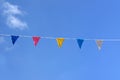 Colorful small flags and blue sky Royalty Free Stock Photo