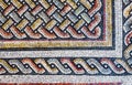 Colorful small tiles of an ancient floor mosaic