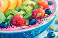 colorful smoothie bowl, topped with fresh fruit, nuts, and seeds, showcasing the vibrant colors and textures of the Royalty Free Stock Photo