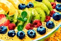 colorful smoothie bowl, topped with fresh fruit, nuts, and seeds, showcasing the vibrant colors and textures of the Royalty Free Stock Photo