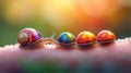 Colorful snails on a finger Royalty Free Stock Photo