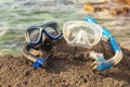 A Colorful snorkle or diving mask located on the rocks Royalty Free Stock Photo