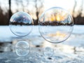 Colorful soap bubbles reflecting the sunset Royalty Free Stock Photo