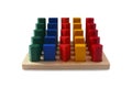 Colorful socket cylinder wooden blocks isolated on a white background. Montessori children educational toys