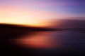 Colorful soft pink background of the sunrise over the sea. Pink romantic sunset color backgrounds. Blurry abstract art background. Royalty Free Stock Photo