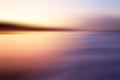 Colorful soft pink background of the sunrise over the sea. Pink romantic sunset color backgrounds. Blurry abstract art background Royalty Free Stock Photo