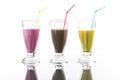 Colorful sommer frappes with reflection on bright background Royalty Free Stock Photo