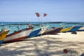 South-East Asian fishing boats resting at the beach in Kuala Terengganu, Malaysia Royalty Free Stock Photo