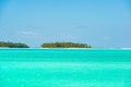 Aitutaki, Cook Islands, paradise on earth, clear turquoise water, white sand, small islands with palms, South Pacific Island Royalty Free Stock Photo